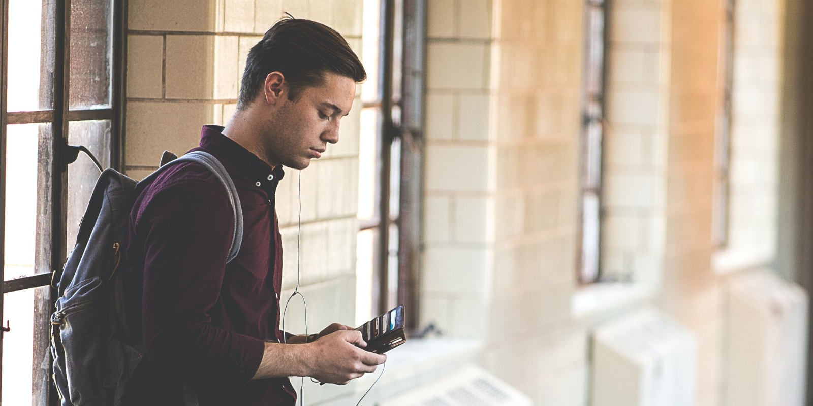 student looking at cell phone