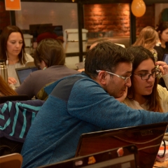 adults working together at a table