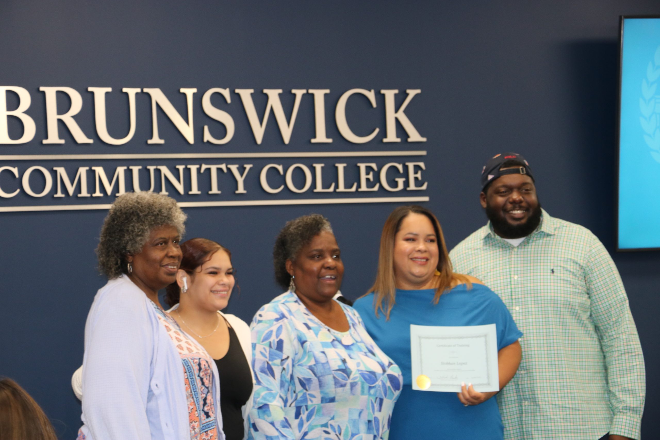 a graduate and her family