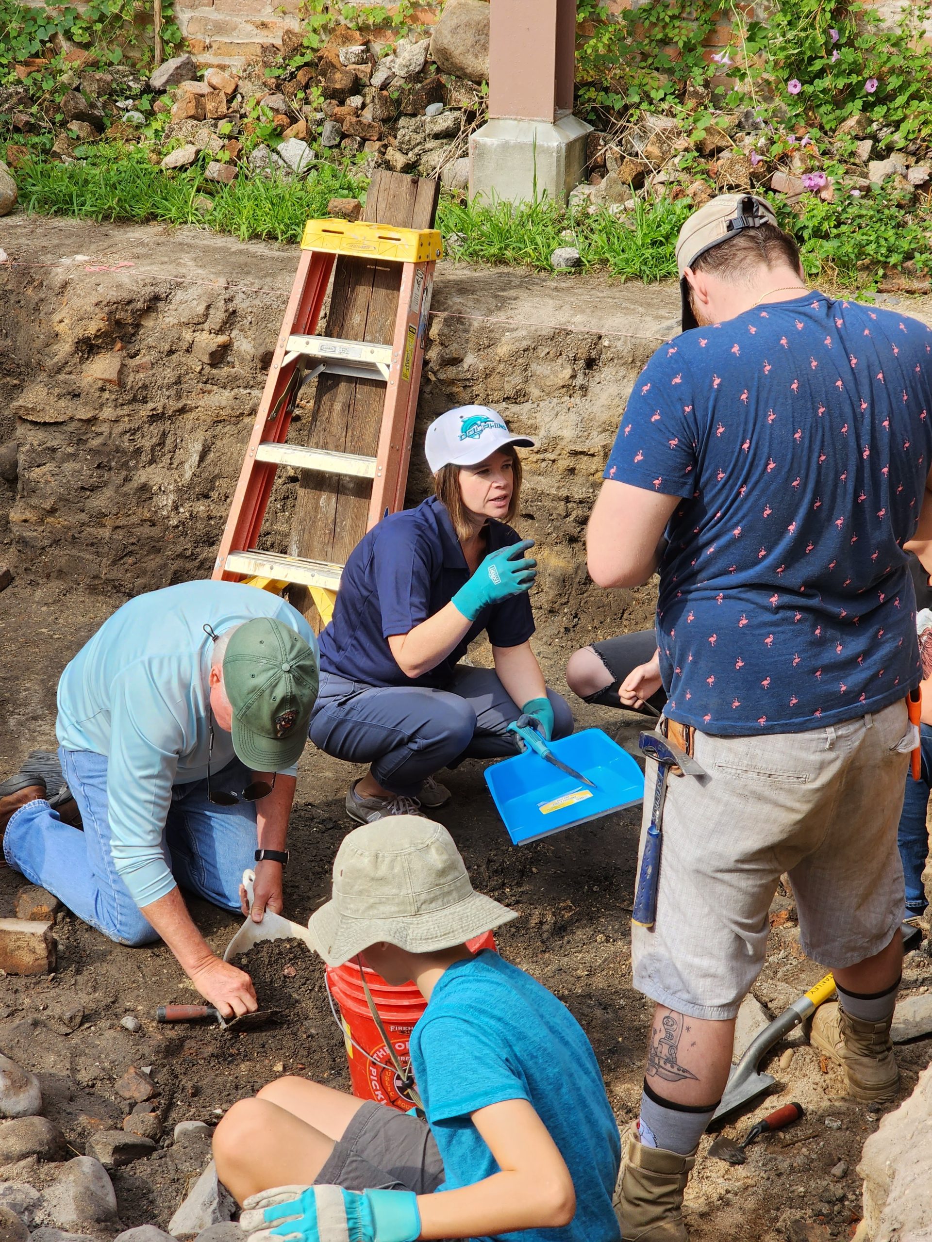 BCC instructor and students at an offsite field trip to an archeological dig