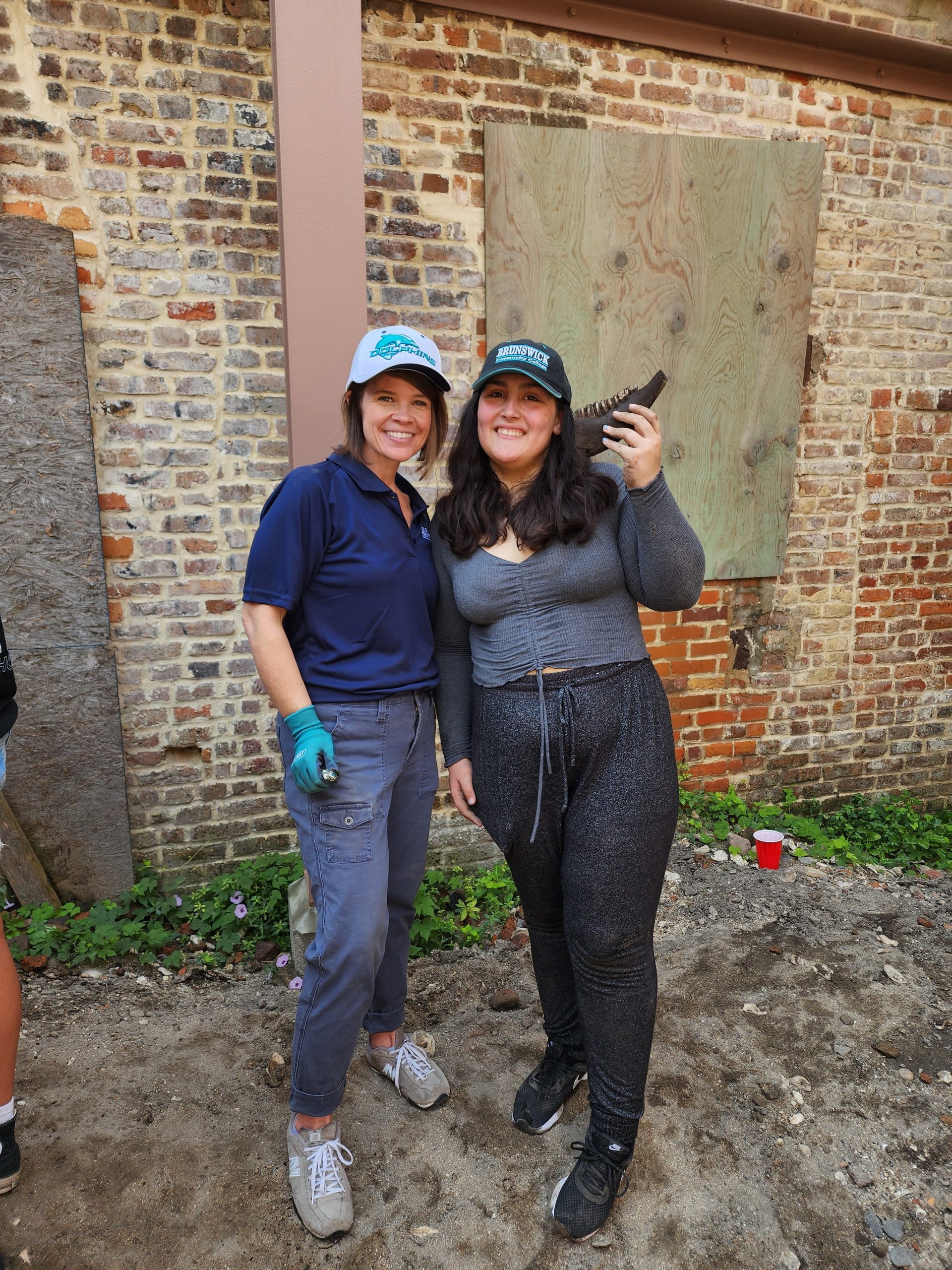 BCC instructor and students at an offsite field trip to an archeological dig