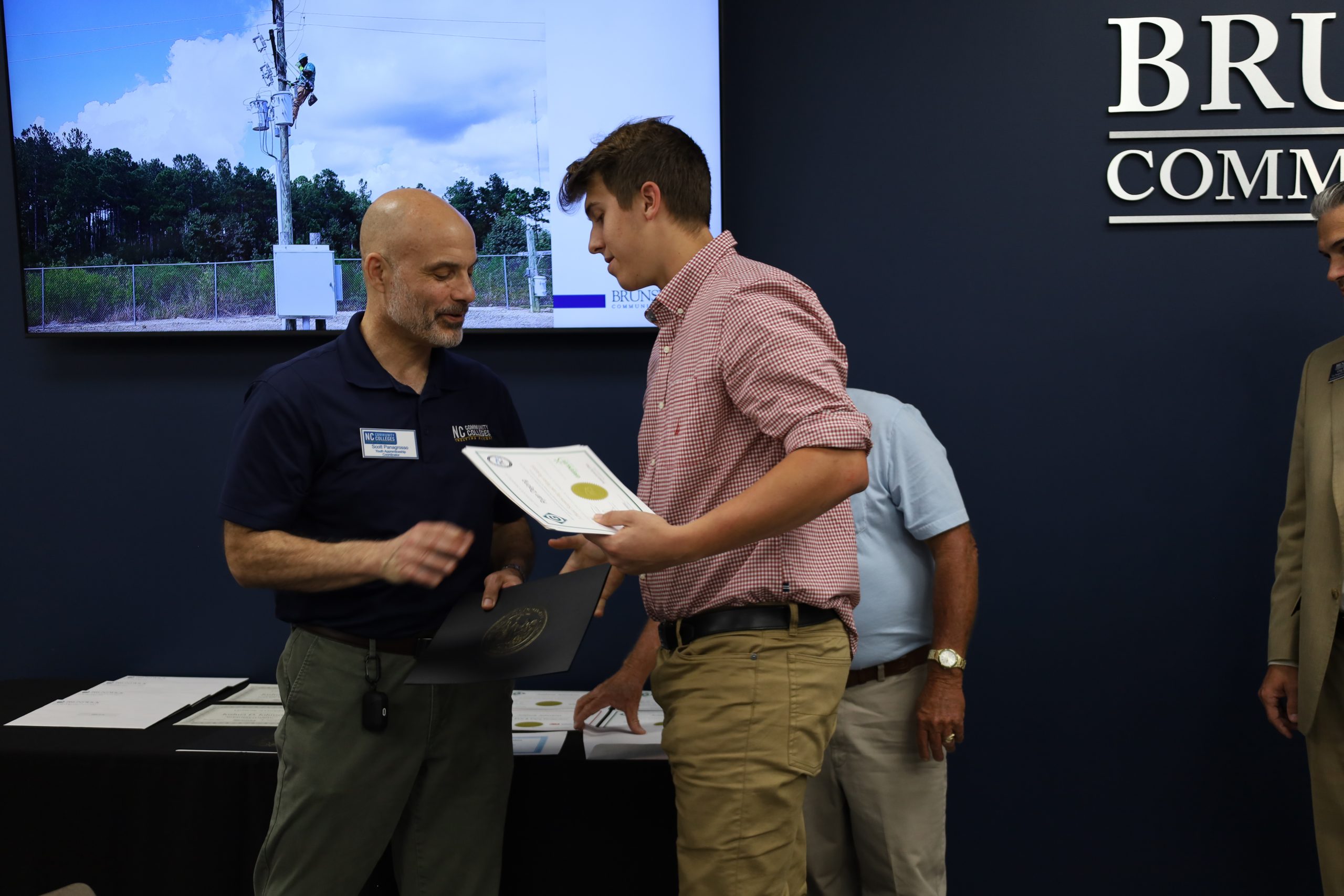 Photo of student at Lineworker graduation ceremony