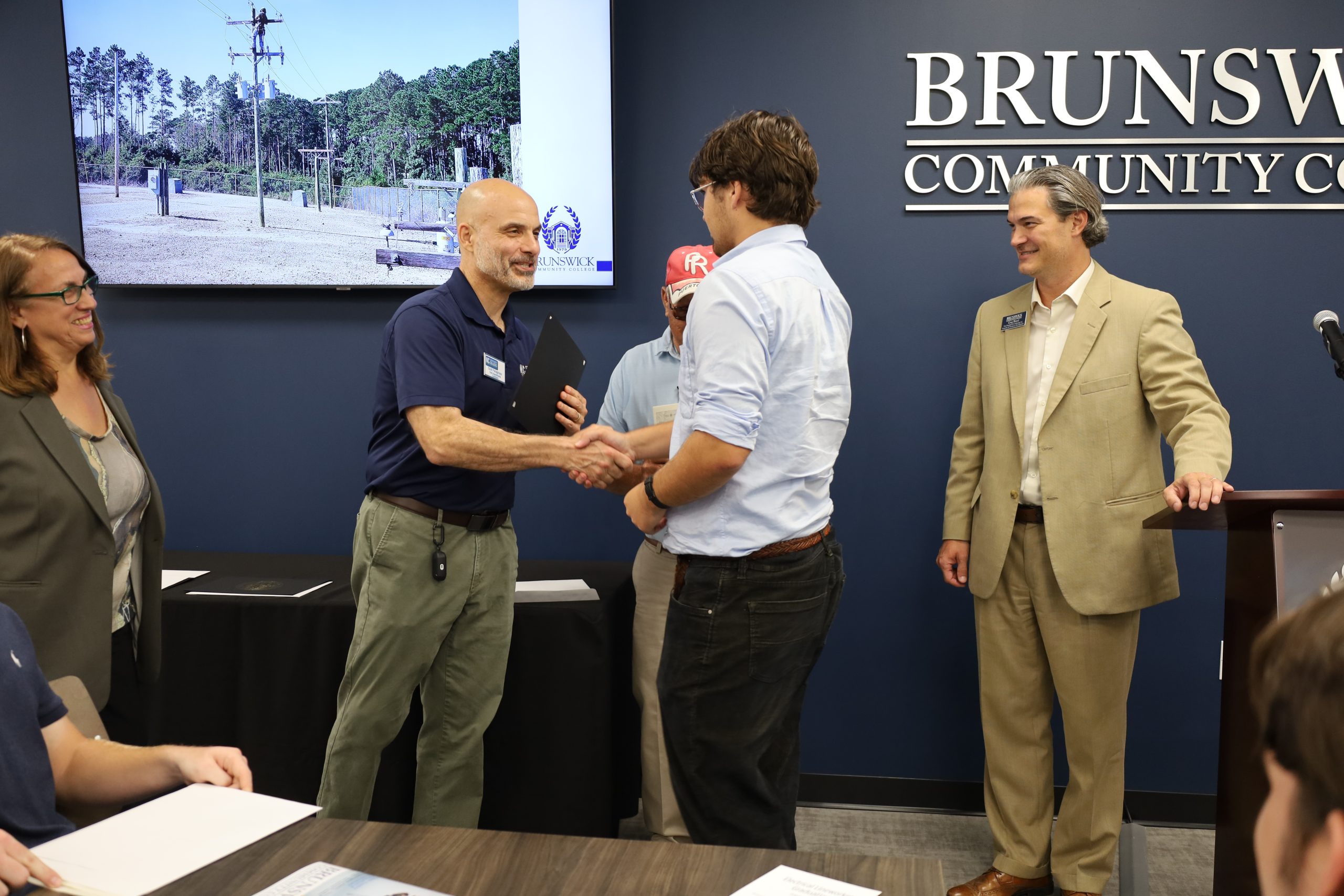 Photo of student at Lineworker graduation ceremony