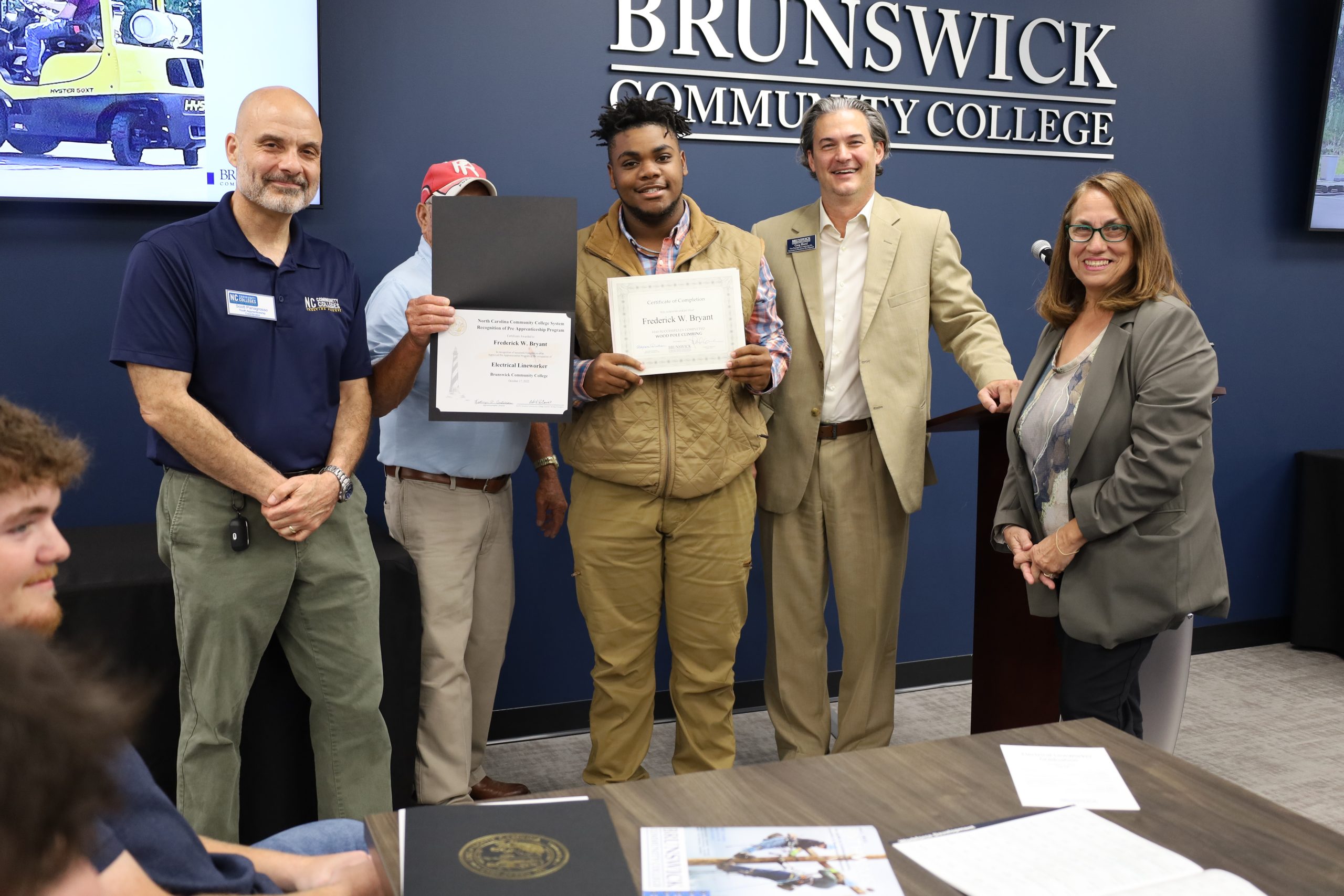 Photo of student at Lineworker graduation ceremony