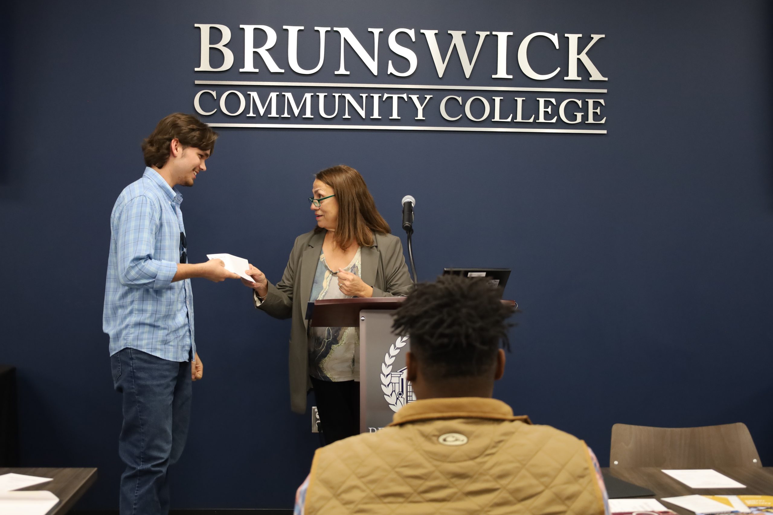 Photo of student at Lineworker graduation ceremony