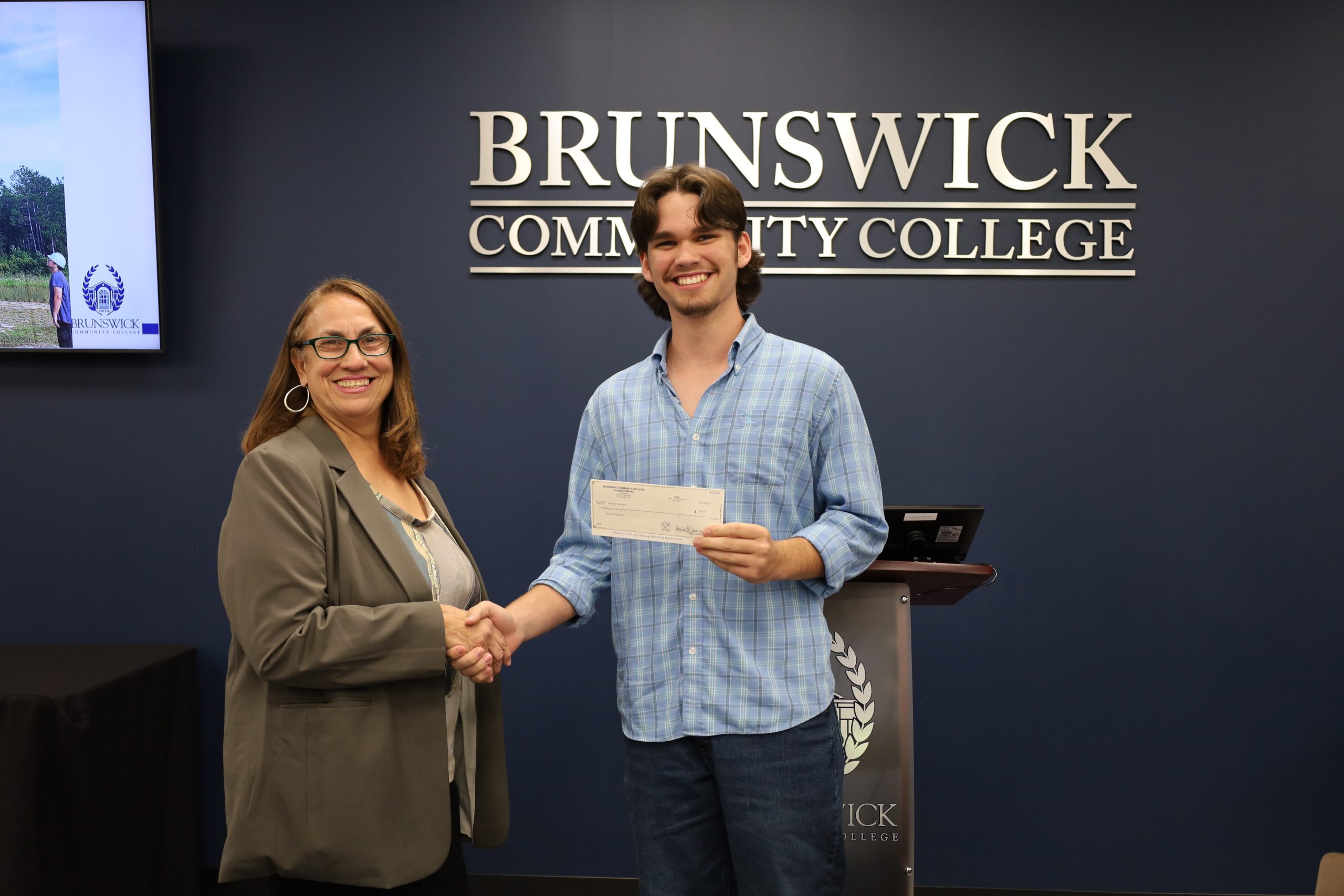 Photo of student at Lineworker graduation ceremony