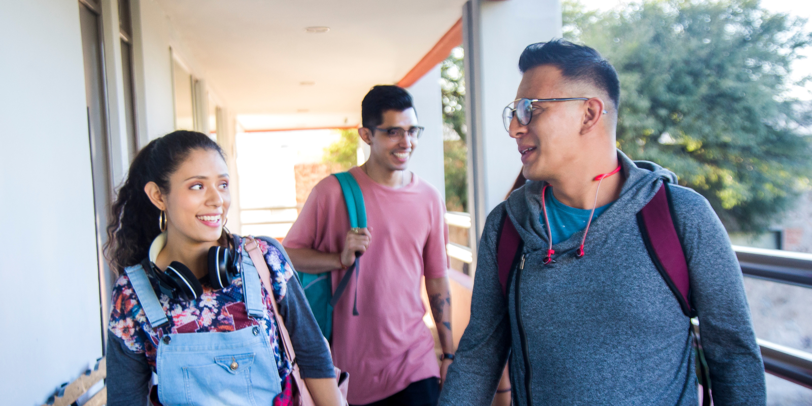 three multicultural students