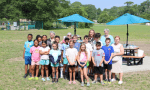 Group photo of children, donors, and staff at the dedication of the Donna Mandell Creativity Cove at BCC's Southport Center