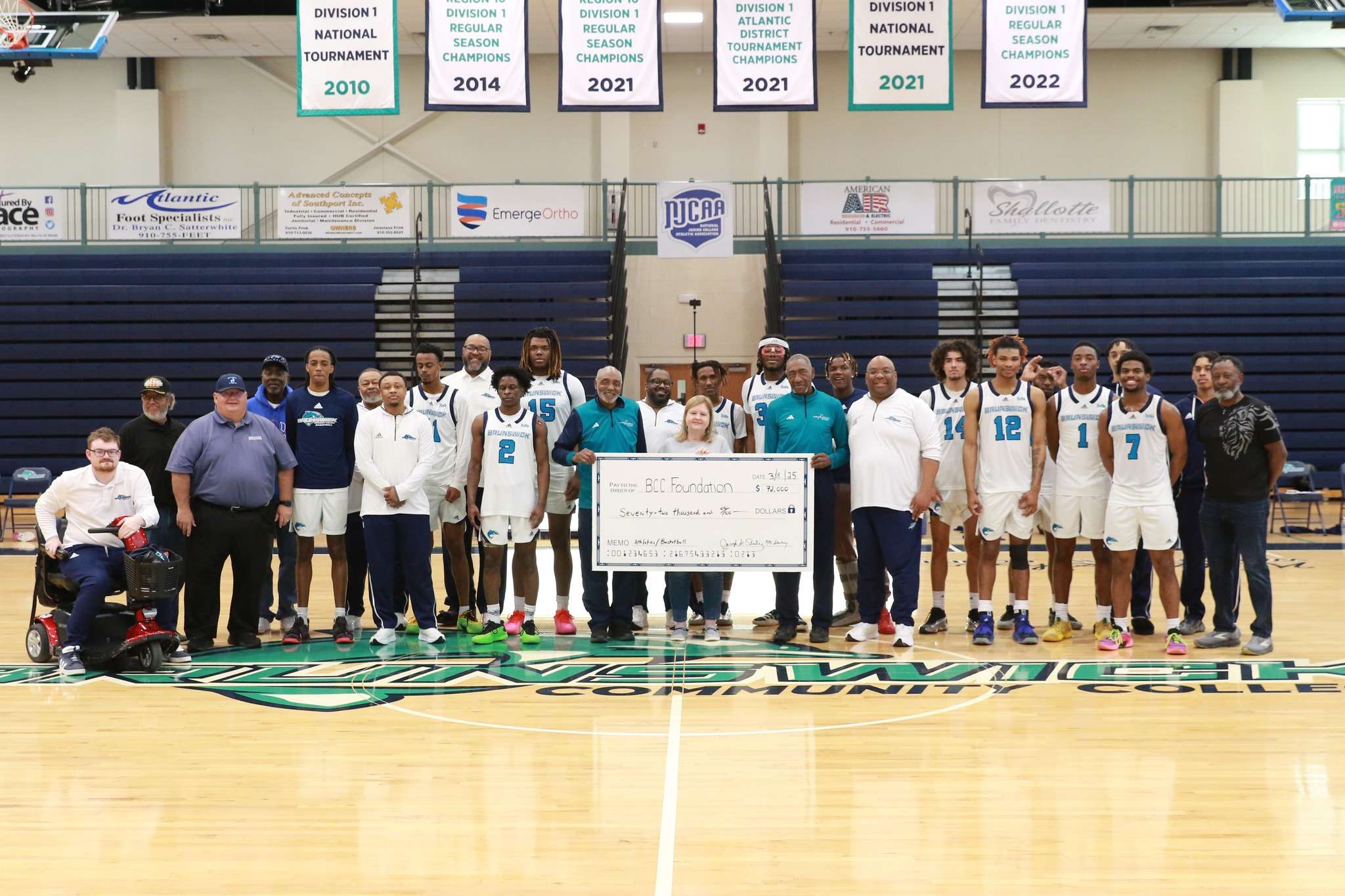 The Stanley Brothers check presentation to the Foundation of BCC in support of BCC Men's Basketball