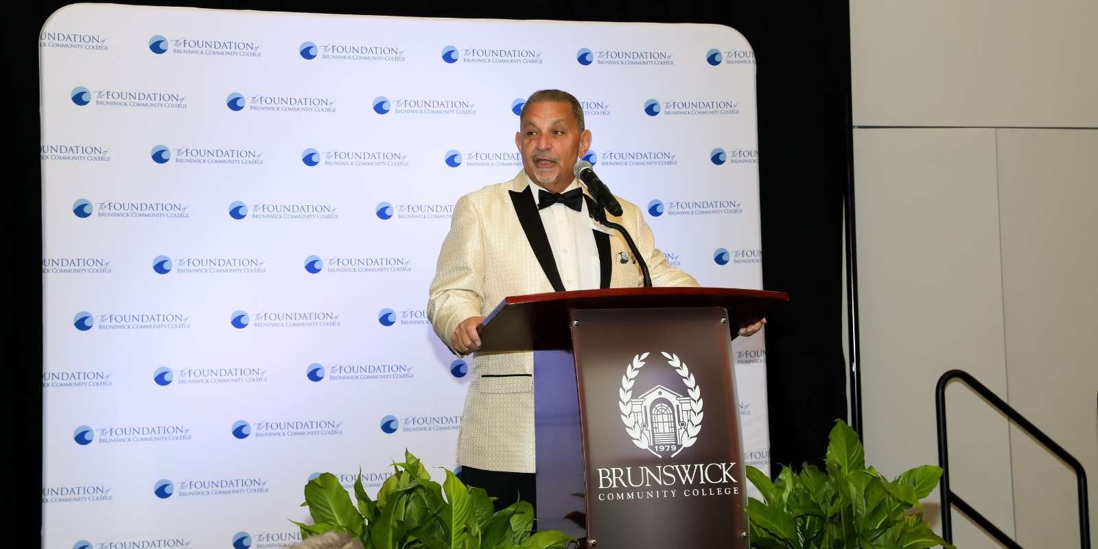 Commissioner Mike Forte speaking at Bella Italia