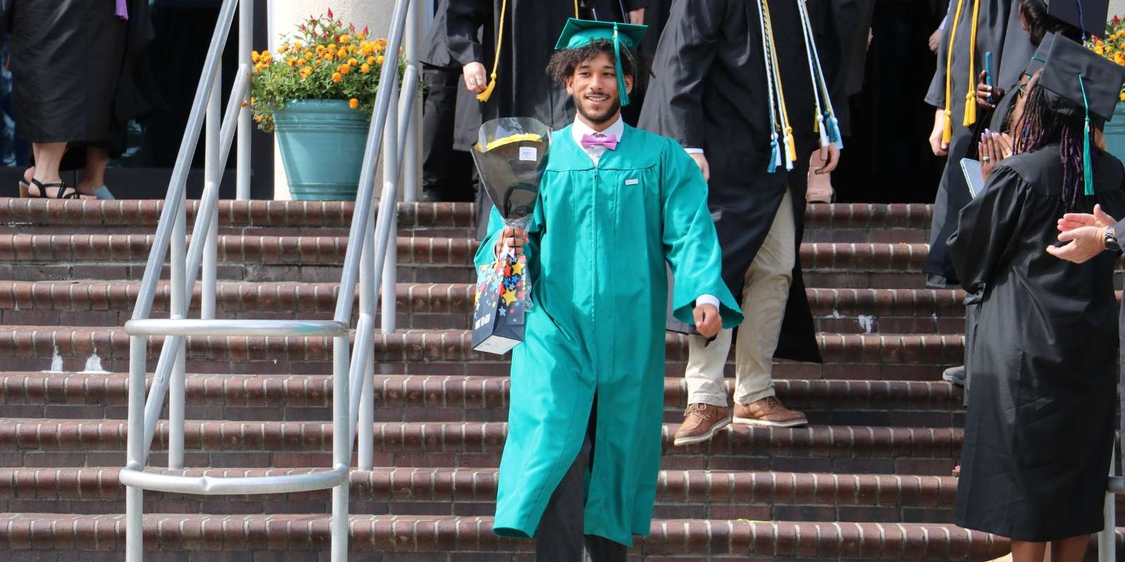 An adult education student on graduation day