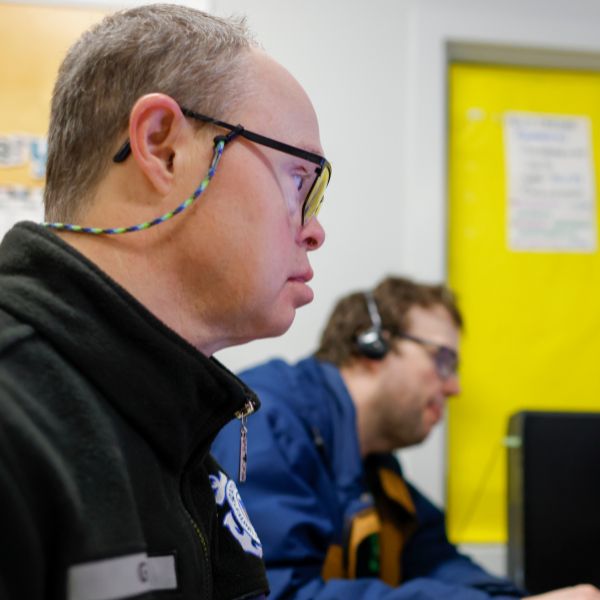 Two BIP students in computer class