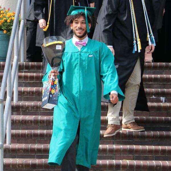 An adult education student on graduation day