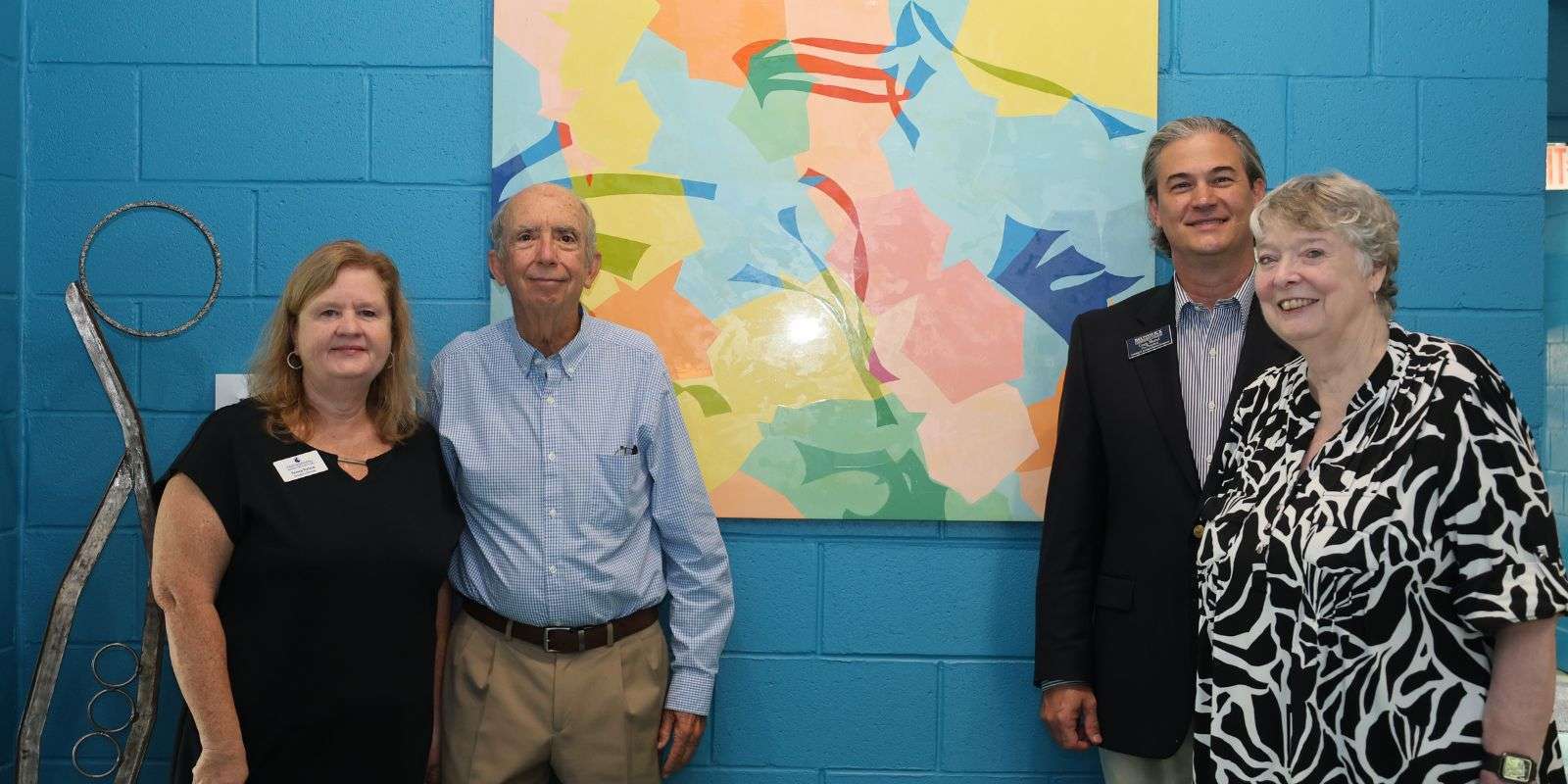 A photo of BCC leadership and donors at the dedication of a sculpture at Southport Center