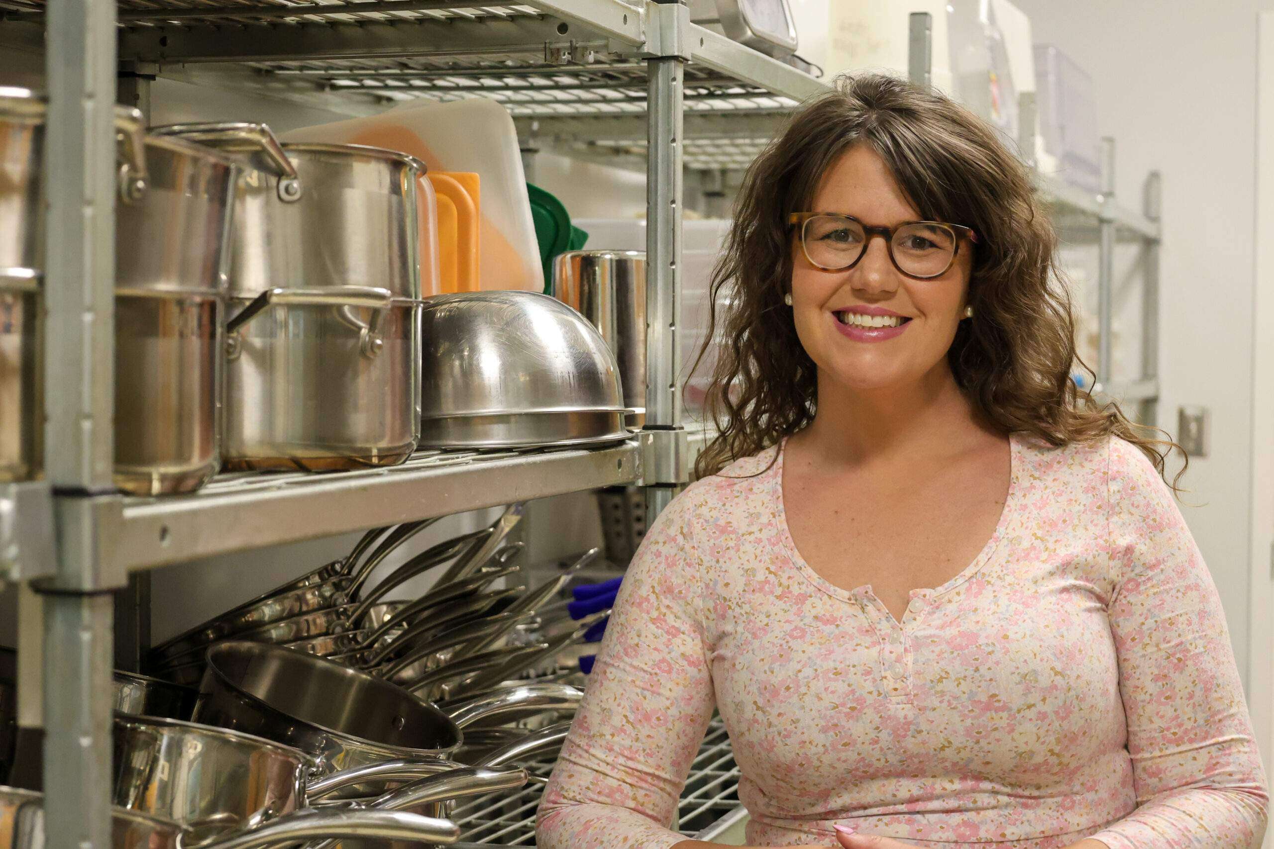 Coordinator of Culinary Arts Lauren McCoy smiling at the camera