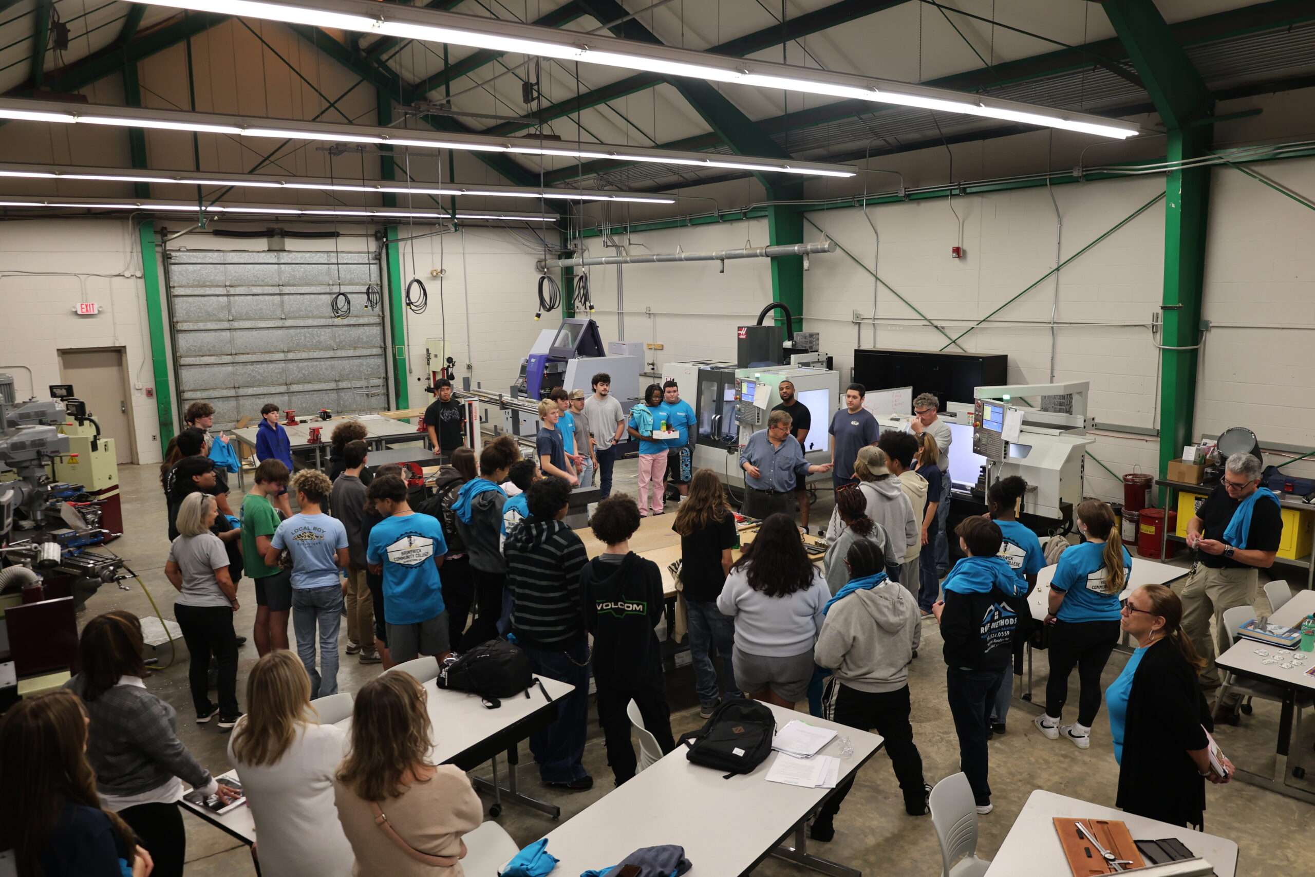 high school students touring BCC machining lab