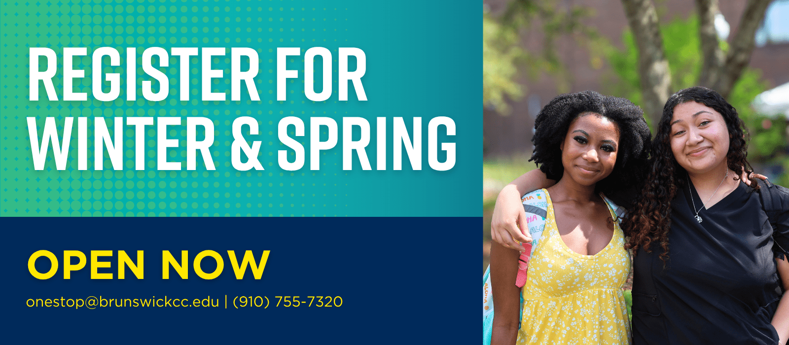 2 female students smiling at the camera