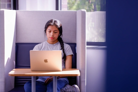 a girl using her laptop