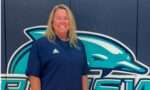 Karlyn Stephens, new softball coach smiling at the camera