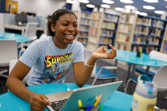 student in a library