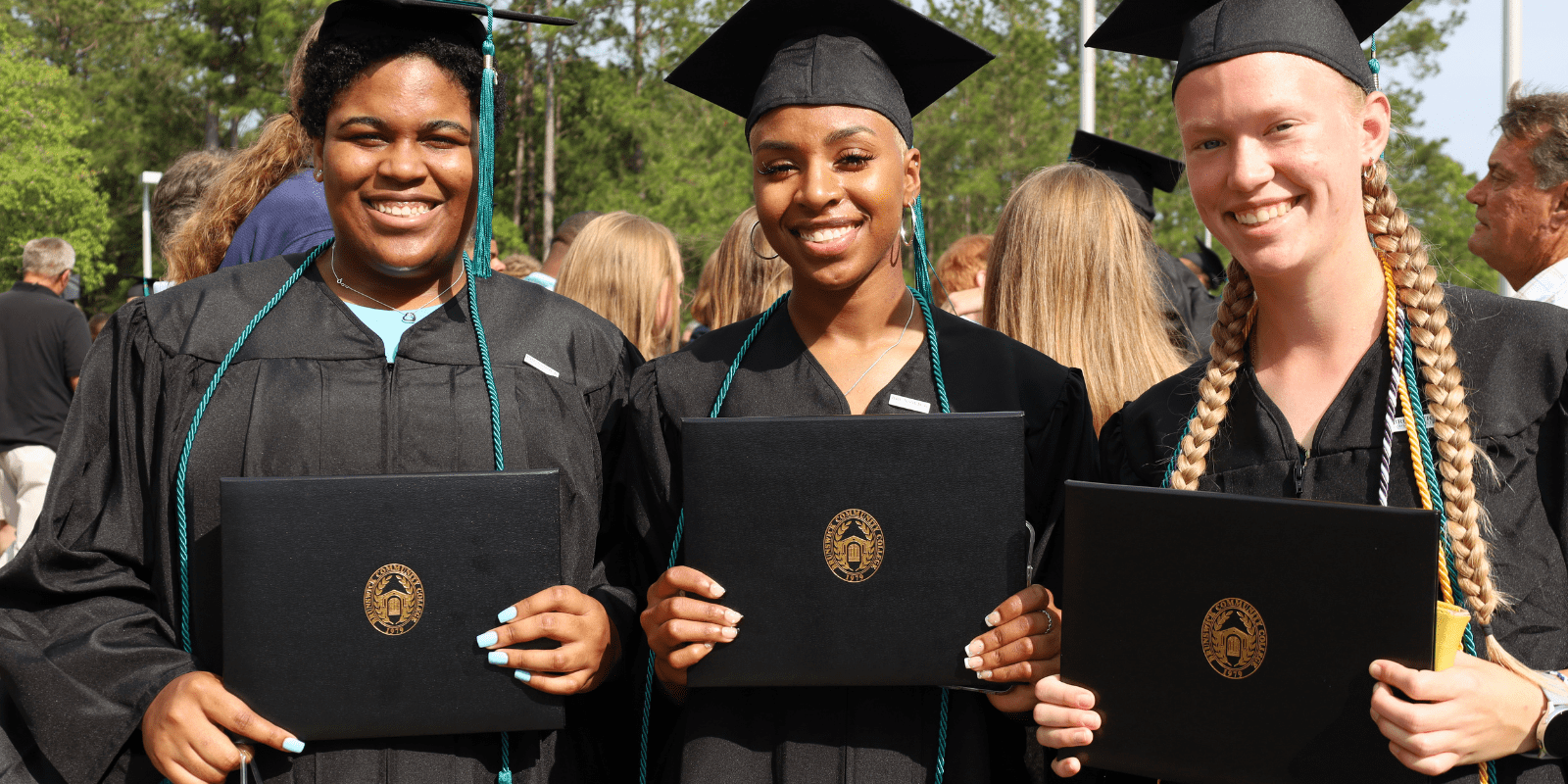 three female graduates