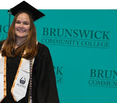 BrunswickComCol_WebsiteAsset_Mobile_GraduateLady_HeadRoom