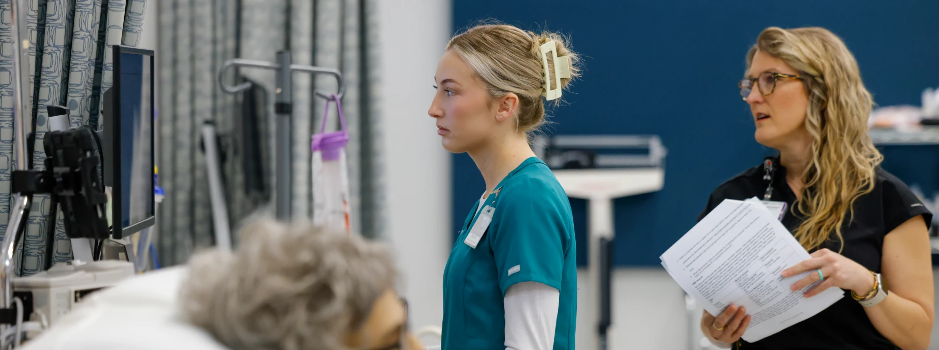 Nurse checking up on patient Banner