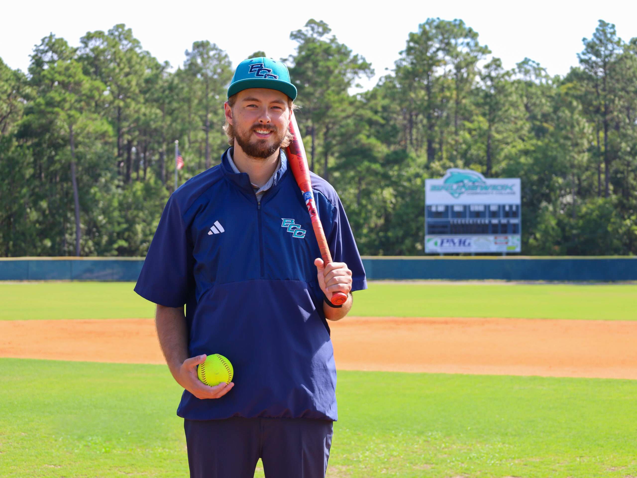 New softball coach on pitcher's mound
